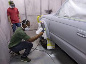 Military pilot surprised with freshly painted truck by Holmes Collision Repair Technology class